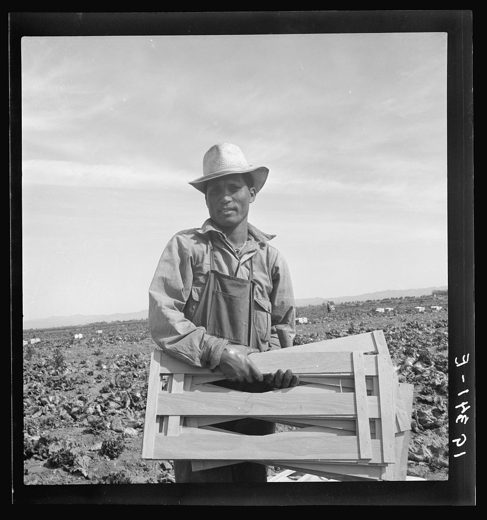 Black-and-white portrait of a Filipino field laborer in California’s Imperial Valley in 1939.